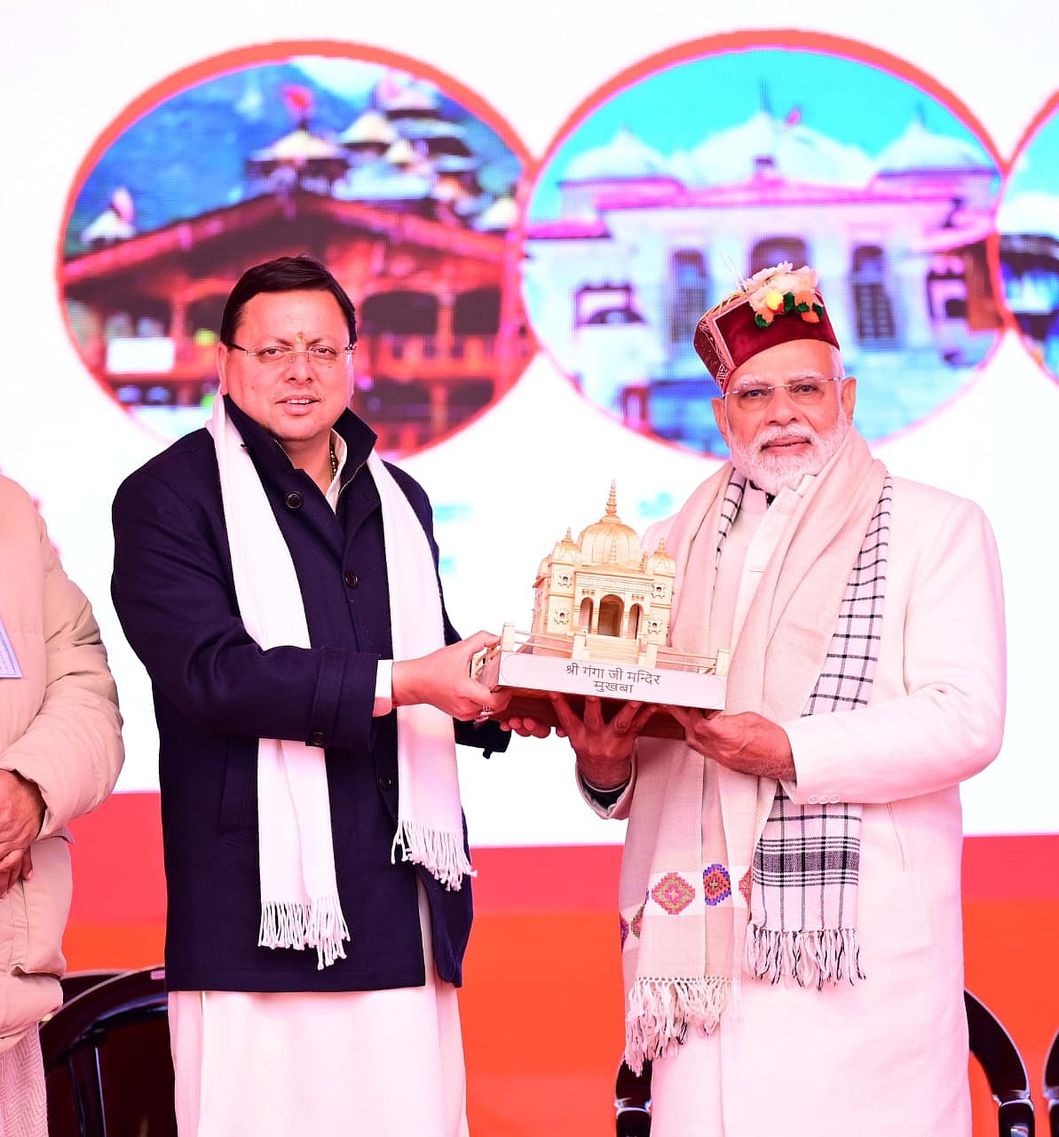 Prime Minister Narendra Modi with Chief Minister Pushkar Singh Dhami at a public gathering in Mukhwa
