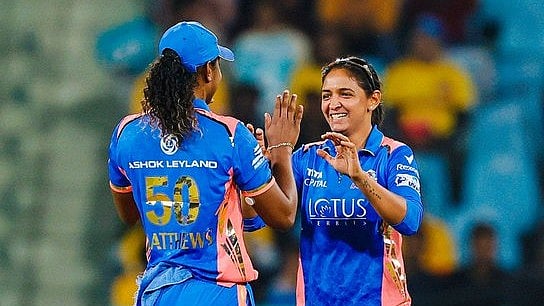 X/mipaltan : Mumbai Indians' Hayeley Matthews with captain Harmanpreet Kaur.
