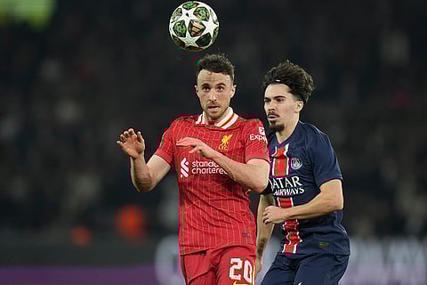 UCL round of 16 first leg, PSG vs LFC: Liverpool's Diogo Jota and PSG's Vitinha go for the ball