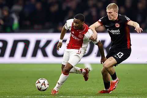 Europa League, Ajax vs Eintracht Frankfurt: Ajax's Jorrel Hato duels for the ball with Eintracht Frankfurt's Rasmus Kristensen
