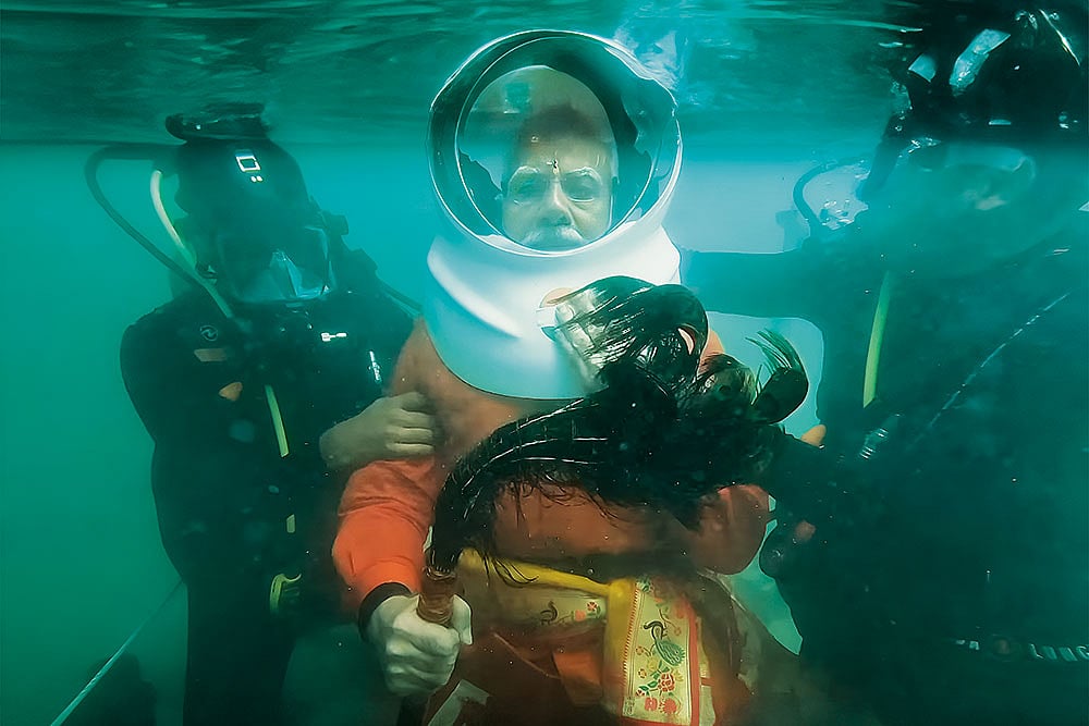 | Video screengrab via official Narendra Modi X account : For a Glimpse of the Submerged City: Prime Minister Narendra Modi took a deep dive in the Arabian Sea in Gujarat in February 2024