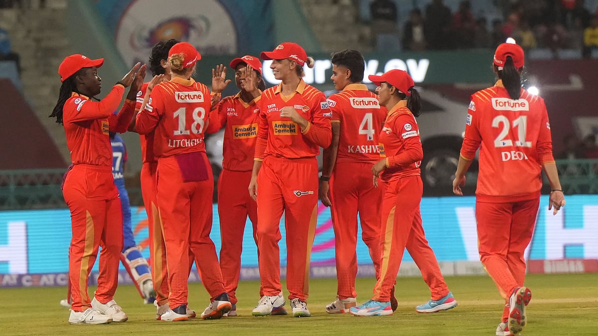  Gujarat Giants players celebrate a wicket during the Women's Premier League (WPL) 2025 cricket match between Delhi Capitals and Gujarat Giants, at Ekana Cricket Stadium, in Lucknow, Friday, March 7, 2025.  - (PTI Photo/Nand Kumar)

