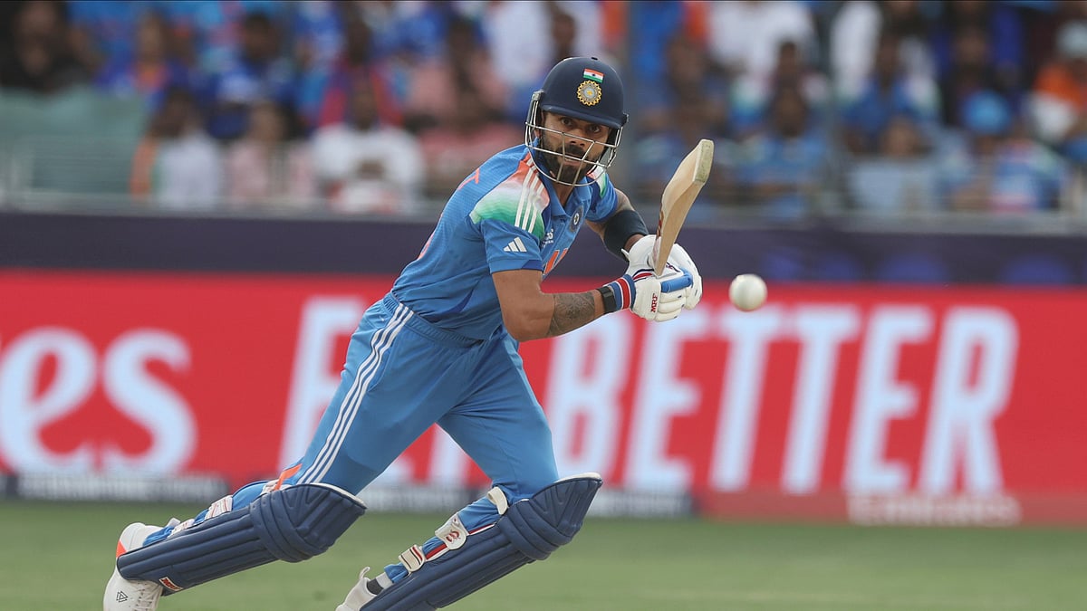 AP Photo/Christopher Pike : India's Virat Kohli plays a shot during the ICC Champions Trophy semifinal cricket match between India and Australia at Dubai International Cricket Stadium in Dubai.