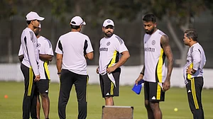 PTI Photo/Arun Sharma : India's captain Rohit Sharma with teammates during a training session ahead of the ICC Champions Trophy 2025 final cricket match between India and New Zealand, in Dubai.