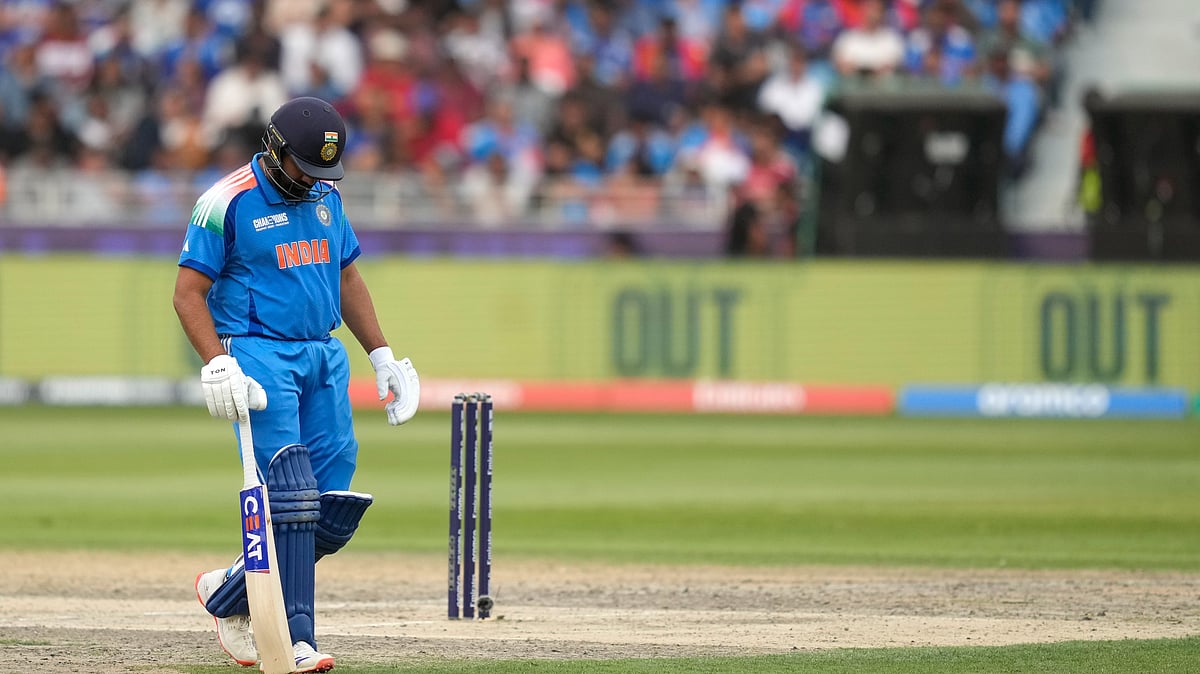 Indias captain Rohit Sharma walks off the field. AP Photo
