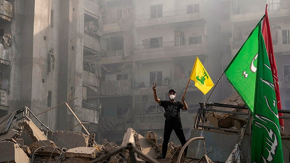 | Photo: AP/Hassan Ammar : Israeli airstrike in Dahiyeh