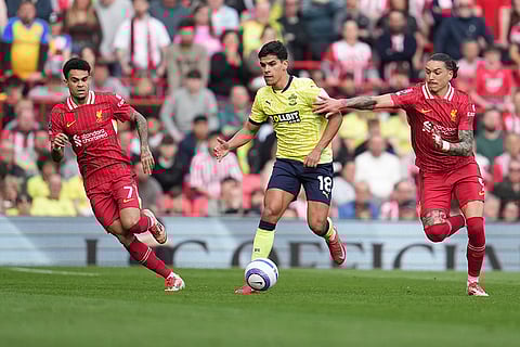 EPL 2024-25, Liverpool vs Southampton: Southampton's Mateus Fernandes challenges for the ball with Liverpool's Darwin Nunez