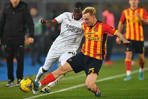 Serie A, US Lecce vsAC Milan: Lecce's Balthazar Pierret and AC Milan's Yunus Musah in action