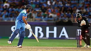 AP/Christopher Pike : India's captain Rohit Sharma, left, looks on as New Zealand's Tom Latham stumps him out during the ICC Champions Trophy final cricket match between India and New Zealand at Dubai International Cricket Stadium in Dubai, United Arab Emirates, Sunday, March 9, 2025.