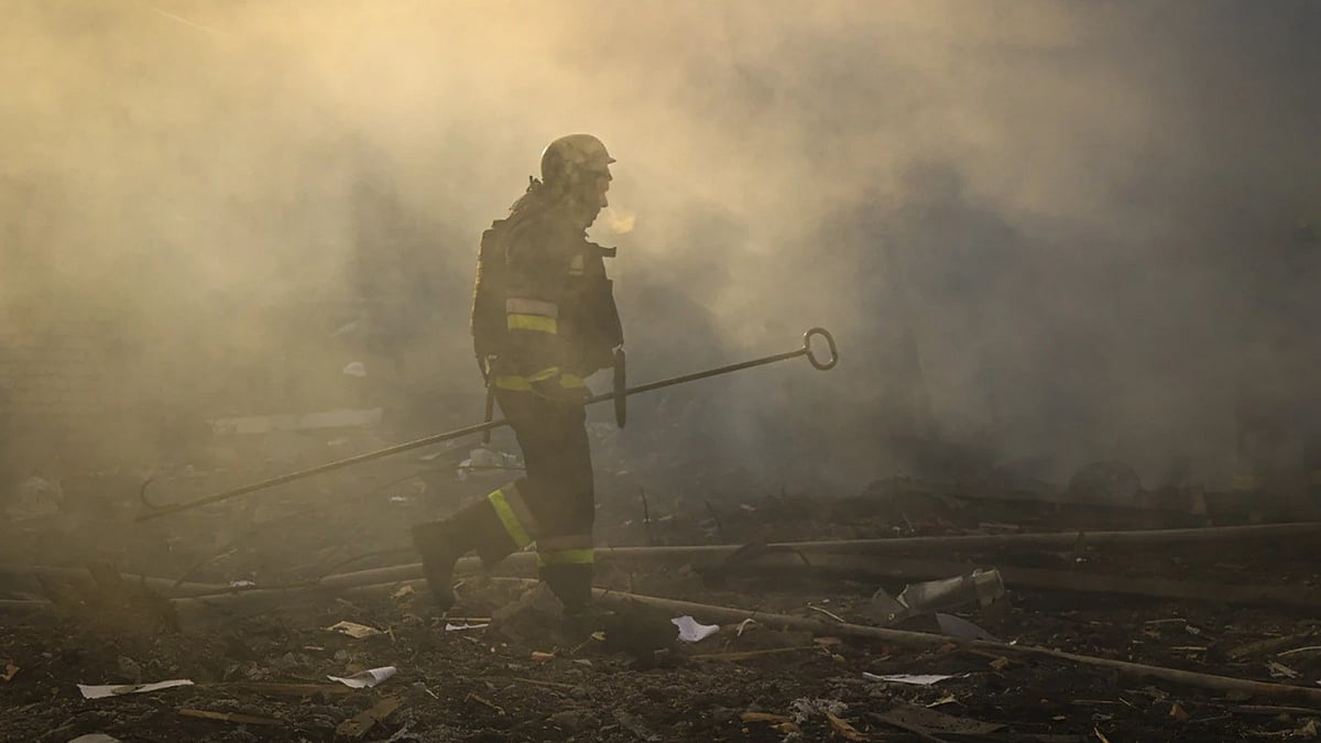 | Image- Ukrainian Emergency Service via AP : In this photo provided by the Ukrainian Emergency Service, a firefighter works to extinguish the fire following a Russian rocket attack in Kharkiv, Ukraine, Friday, March 7, 2025.