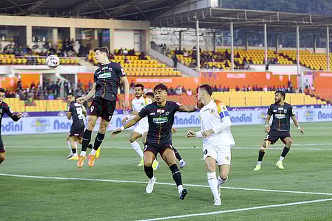 ISL 2024-25: Guillermo Fernandez Hierro (9) of NEUFC goes for a header