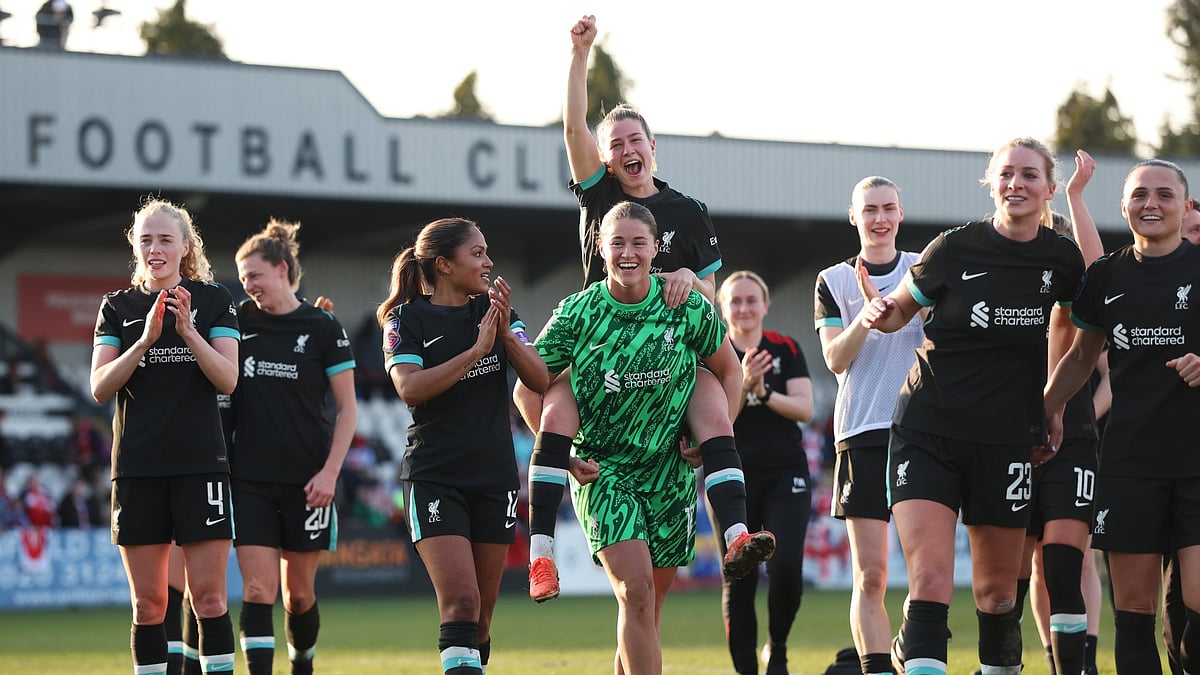 Liverpool celebrate beating Arsenal in Women's FA Cup quarterfinal match.  - null