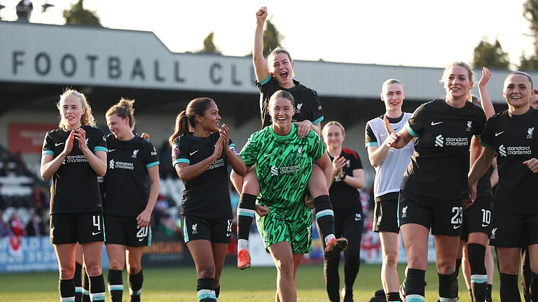 Liverpool celebrate beating Arsenal in Women's FA Cup quarterfinal match. - null
