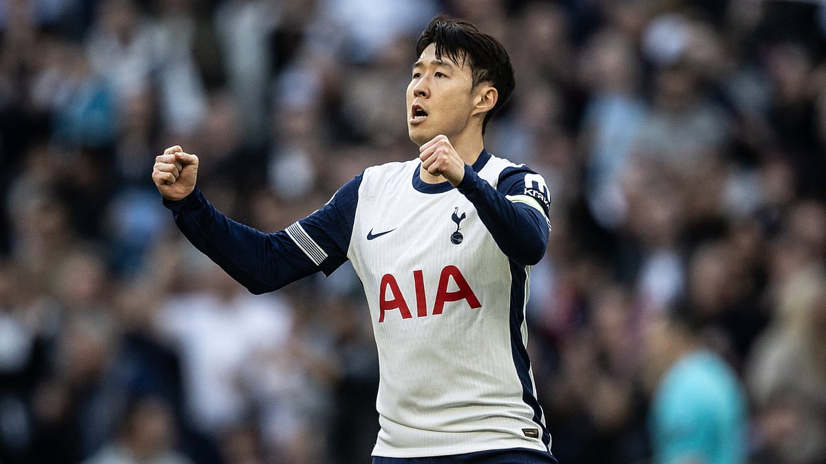Son Heung-min celebrates his equaliser against Bournemouth - null
