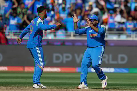 CT 2025, IND vs NZ final: India's Varun Chakravarthy celebrates after the dismissal of New Zealand's Glenn Phillips