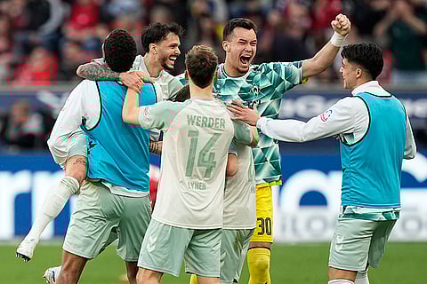 Bundesliga, Leverkusen and Werder Bremen: Bremen's players celebrate after they scored the second goal