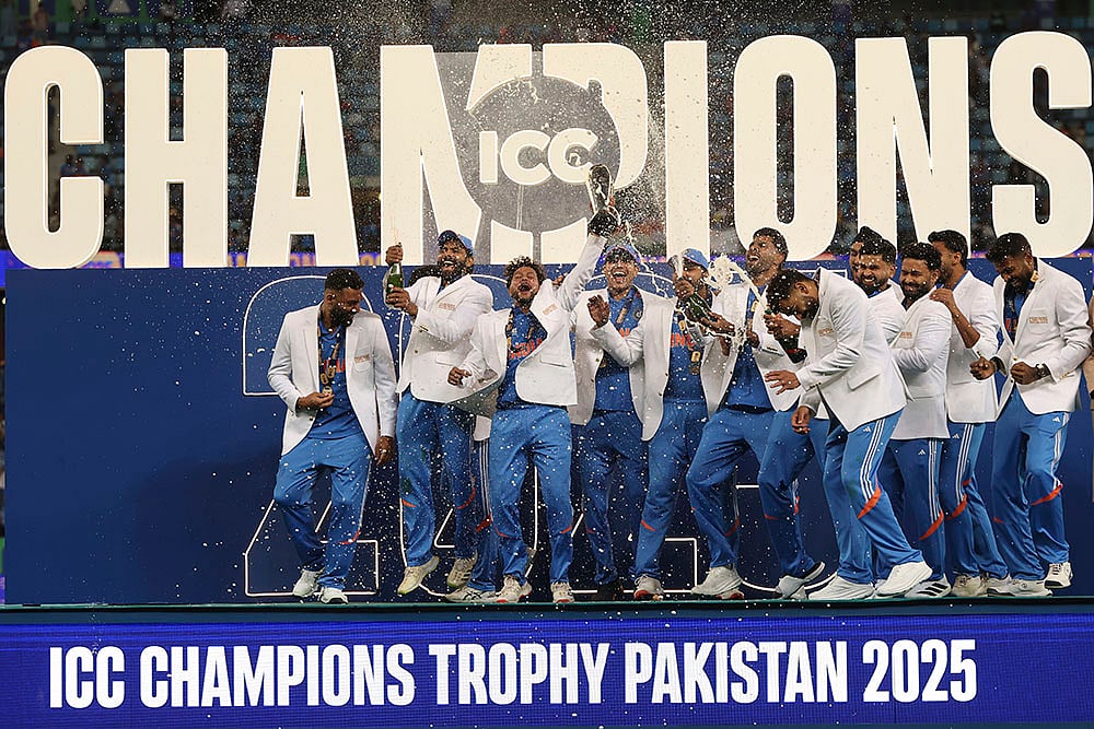 | Photo: AP/Christopher Pike : CT 2025, IND vs NZ final: Indian players celebrate with the winners trophy