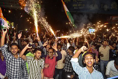 Cricket lovers celebrate Indian team's win in Meerut