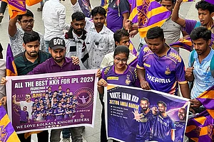 | Photo Courtesy: Special Arrangement : Kolkata Knight Riders fans at the Indian Premier League trophy in Durgapur.