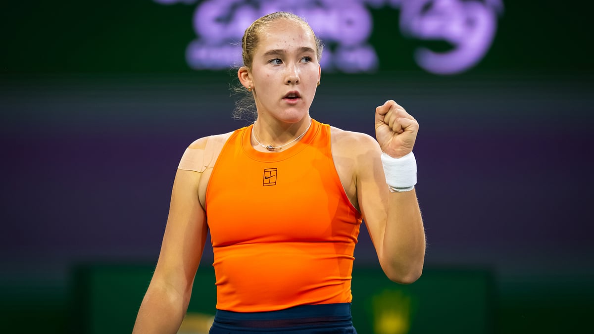 Mirra Andreeva celebrates after converting match point against Clara Tauson