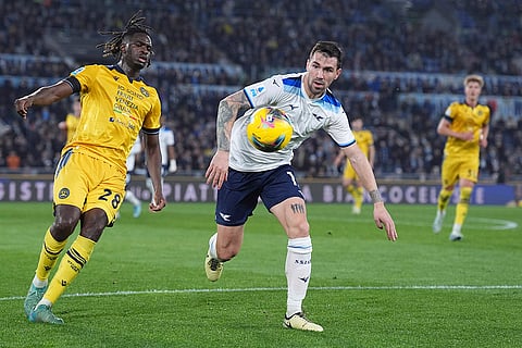 Serie A 2024-25, Lazio vs Udinese: Oumar Solet, left, and Alessio Romagnoli challenge for the ball