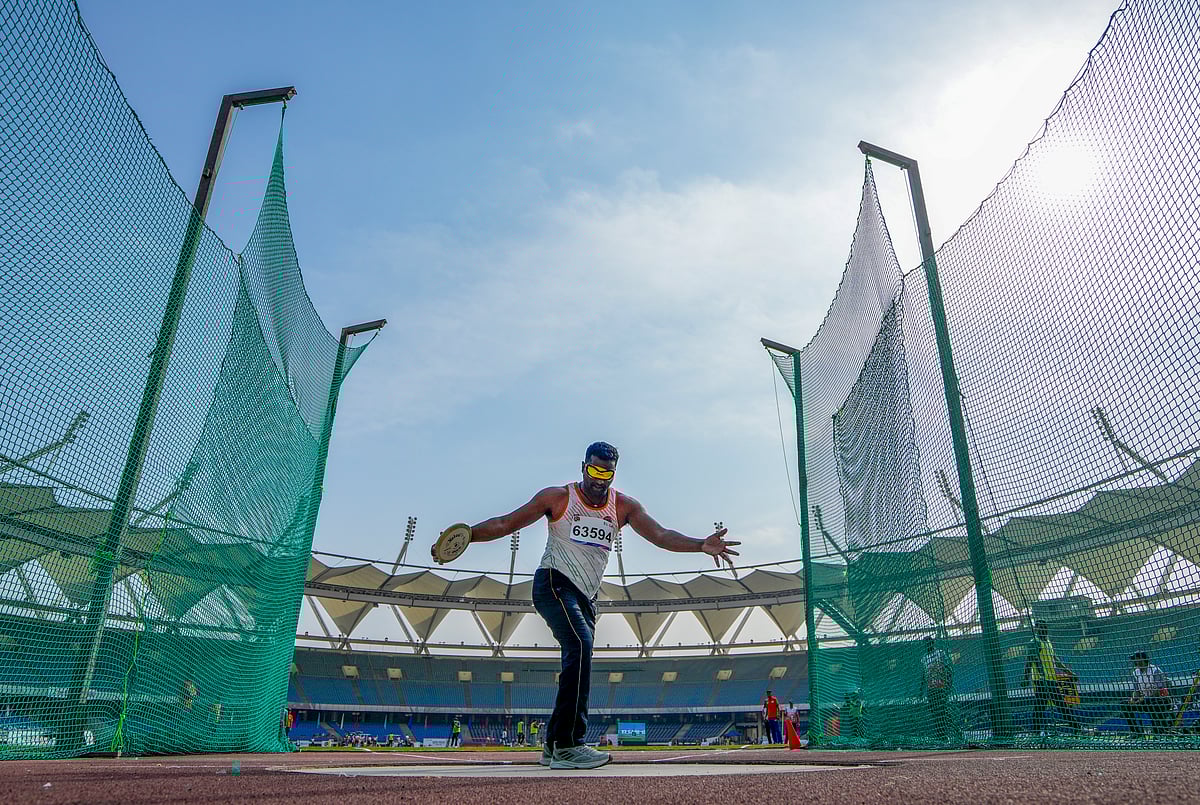 PTI/Ravi Choudhary : Para athlete Janak Singh Harsana competes in the men's discus throw F11 during the opening ceremony of the World Para Athletics Grand Prix 2025, in New Delhi, Tuesday, March 11, 2025.
