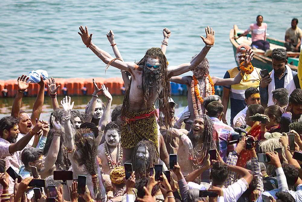 | Photo: PTI : Masan Holi celebrations