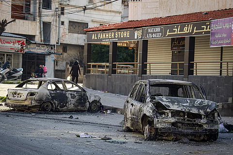 Syria Clashes: Burnt cars remain in Jableh