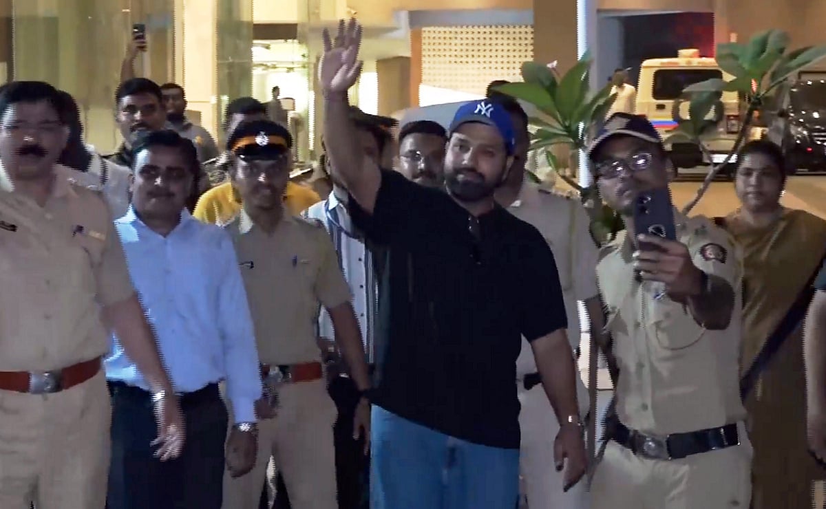 PTI-photo : ndian cricket team skipper Rohit Sharma waves at fans on his arrival at his residence, in Mumbai, Monday, March 10, 2025