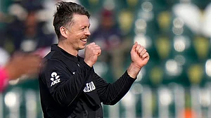 | Photo: AP/Anjum Naveed : ICC Champions Trophy, BAN vs NZ: Michael Bracewell celebrates after taking the wicket of Bangladesh's Mahmudullah