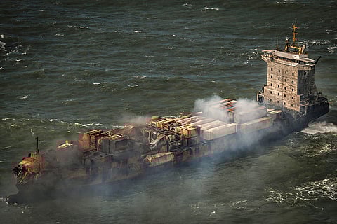 Britain Ships Collide: Smoke billows from the MV Solong