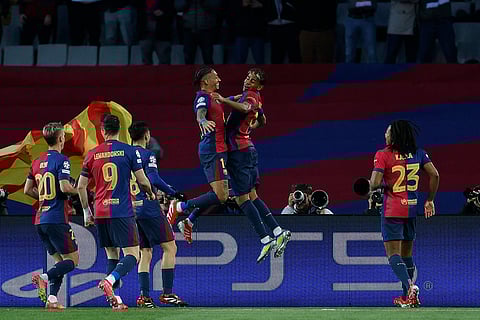 UCL 2024-25, FCB Vs Benfica: Barcelona's Raphinha celebrates with Barcelona's Lamine Yamal after scoring his side's first goal
