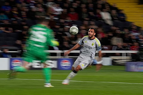 UCL 2024-25, FCB Vs Benfica: Benfica's Vangelis Pavlidis is challenged by Barcelona's goalkeeper Wojciech Szczesny 