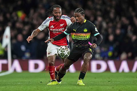 UCL 2024-25, Arsenal vs PSV: Arsenal's Raheem Sterling challenges for the ball with PSV's Tyrell Malacia
