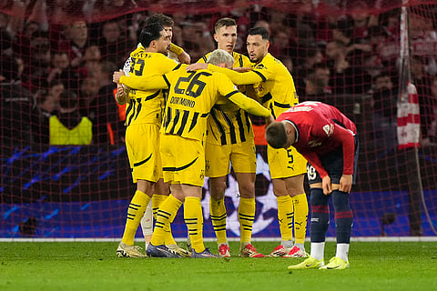 UCL 2024-25, Lille vs Dortmund: Dortmund players celebrate after the match