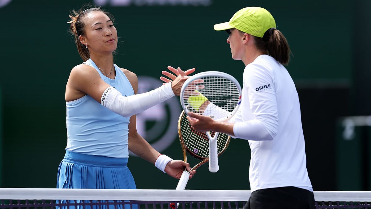Iga Swiatek (right) was a straight-sets winner over Zheng at Indian Wells