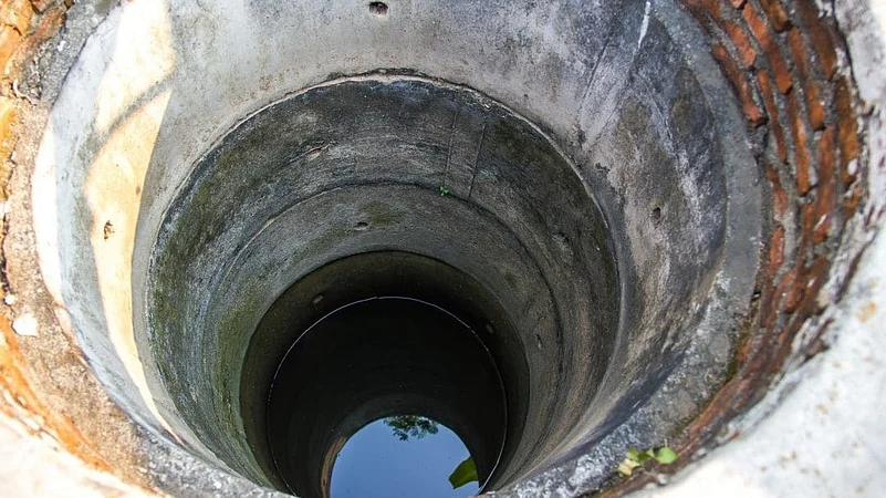 Woman jumped into well with two children