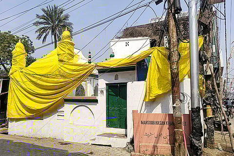 A mosque covered in tarpaulin in Shahjahanpur