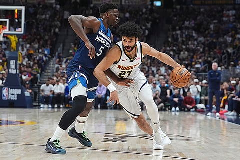 NBA 2024-25, Timberwolves vs Nuggets: Nuggets guard Jamal Murray drives past Timberwolves guard Anthony Edwards