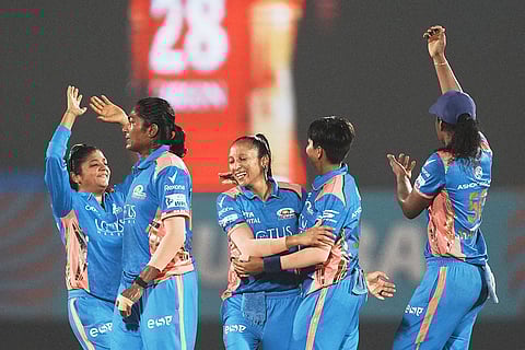 WPL 2025 play-off, MI vs GG: Mumbai Indians' players celebrate the wicket of Gujarat Giants' batter Harleen Deol