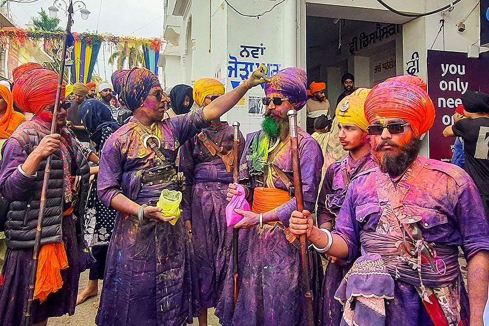 | Photo: PTI : Hola Mohalla festival