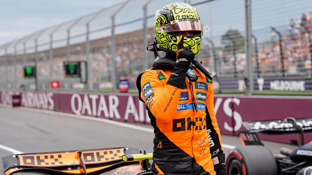 Asanka Brendon Ratnayake/AP : McLaren driver Lando Norris of Britain reacts after taking pole position during qualifying at the Australian Formula One Grand Prix at Albert Park.