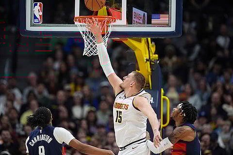 NBA 2024-25: Nuggets center Nikola Jokic (15) drives to the basket