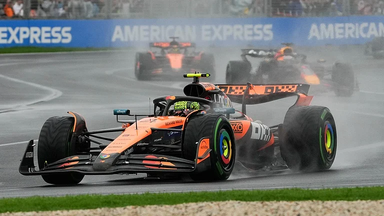 McLaren driver Lando Norris of Britain steers his car during the Australian Formula One Grand Prix at Albert Park, in Melbourne, Australia, Sunday, March 16, 2025. - AP/Heath McKinley