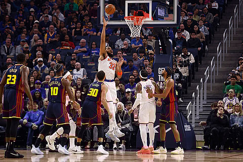 NBA 2024-25: New York Knicks center Karl-Anthony Towns (32) scores