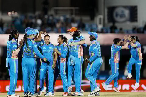 WPL Final 2025 MI vs DC: Mumbai Indians' Shabnim Ismail with her teammates celebrates the wicket of Delhi Capitals' Shafali Verma