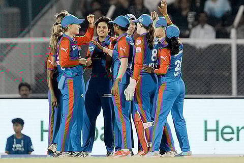 WPL Final 2025 MI vs DC: Delhi Capitals players celebrate the wicket of Mumbai Indians' Harmanpreet Kaur