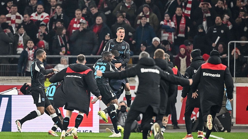 Leverkusen's Patrick Schick and the team celebrate during the German Bundesliga soccer match between VfB Stuttgart and Bayer Leverkusen at the MHP Arena in Stuttgart, Germany, Sunday, March 16, 2025. - Harry Langer/dpa via AP