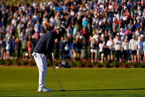 Players Championship Golf: J.J. Spaun putts on the 17th green