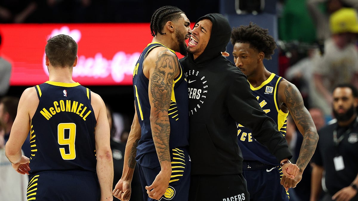Obi Toppin (left) and Tyrese Haliburton celebrate during the Indiana Pacers' win over the Minnesota Timberwolves on March 17, 2025.